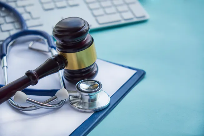 Spinal implant firm’s CFO pleads guilty in kickback conspiracy